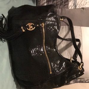 Michael Kors black shiny bag.